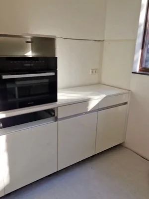 Voorbeeld keukenrenovatie met nieuwe leidingen